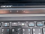 a close up of a laptop keyboard with a key on it