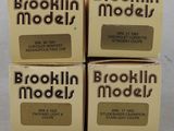 four boxes of brooklyn model cigarettes stacked on top of each other