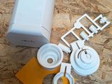 a picture of a small white device on a table