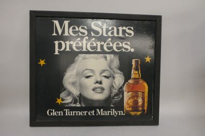 a picture of a marilyn monroe advertisement on the wall