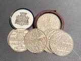 four coasters with a picture of a man and a woman on them
