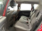 a red car with black seats in the back of it
