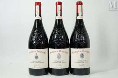 trois bouteilles de vin posées sur une table blanche