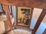 a picture on the back of a chair with a picture on it