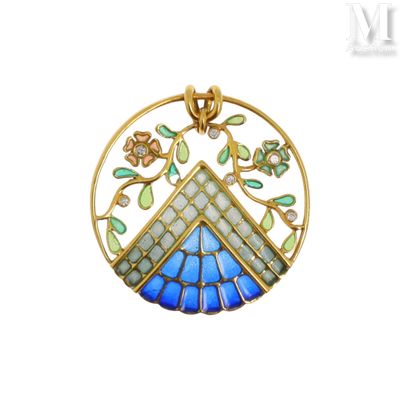un gros plan d'un pendentif bleu et vert sur fond blanc