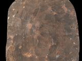 an image of a piece of stone with a design on it