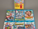 un lot de jeux Nintendo Wii posés sur une table