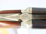 a close up of a pair of scissors on a table