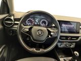 the interior of a car with a steering wheel and dashboard controls