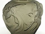 a glass vase with a design on it on a white background