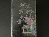 an image of a picture of a vase with flowers in it