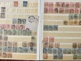 a book with stamps on it sitting on a table