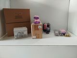 a box of candles and a box of soaps on a shelf