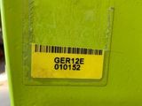 a green parking meter with a barcode on it