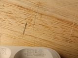 a toothbrush sitting on top of a wooden table