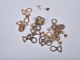 a lot of different metal items on a white surface