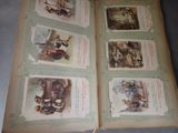 an open book with pictures of children playing with toys on a table