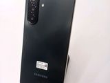 a close up of the back of a black samsung galaxy s20