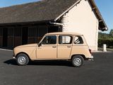 a small tan car parked in front of a building