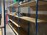 a room with a lot of shelvings in it