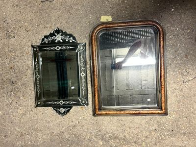 two mirrors on the floor next to each other