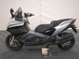 a picture of a motorcycle that is parked in a garage