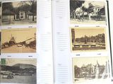 a book with pictures of old buildings on the pages