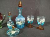 a group of glass items that are on a table