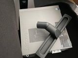 a black chair with a laptop on top of it