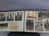 an old photo of a book with pictures of trees in it