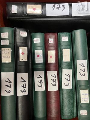 many books on a shelf with asian writing on them