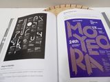 an open book that has a bunch of different designs on it