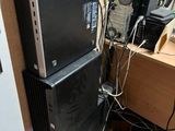 a refrigerator and a computer on top of each other
