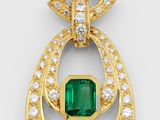 an emerald and diamond pendant