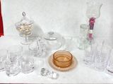 a table with a lot of glassware on it