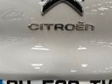 a close up of a car with a logo on it