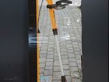 a close up of a box on a table with a corded trimmer