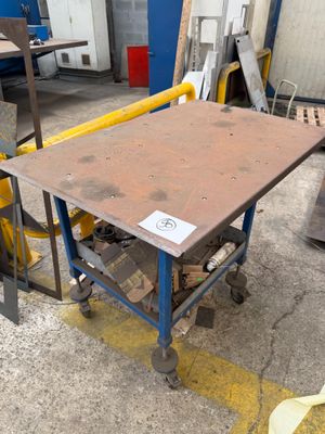 a table that is sitting in the middle of a room