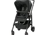 a black stroller with a black canopy and black wheels