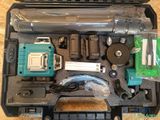 a tool in the case that is sitting on the floor