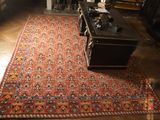 a rug on the floor in a living room