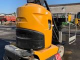 an image of a forklift parked in a parking lot