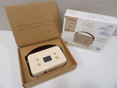 a box with a game controller in it and a box with a game controller in it