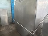 a large stainless steel dishwasher inside of a building