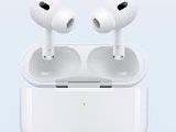 an image of a pair of airpods sitting on top of a white box