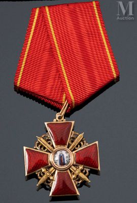 a close up of a medal with a cross on it