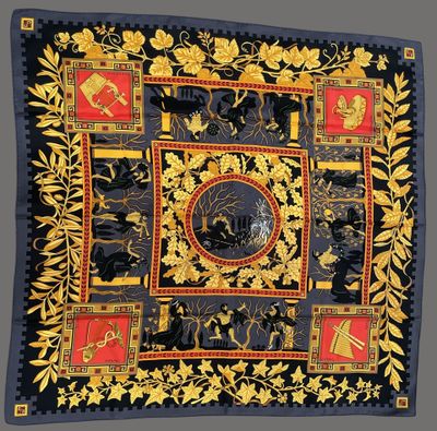 an image of a black and gold scarf with a picture of a horse