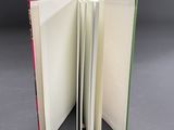 an open book that is sitting on a table
