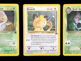 Trois cartes Pokémon sont représentées en ligne sur un fond noir