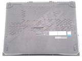 the back of a laptop computer with a broken keyboard on it